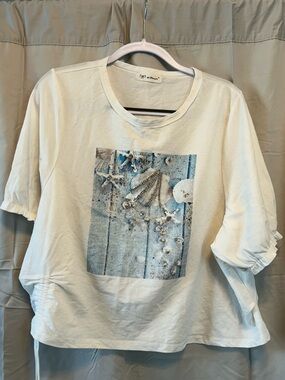 Closet Cream Top with Brown Logo Tag